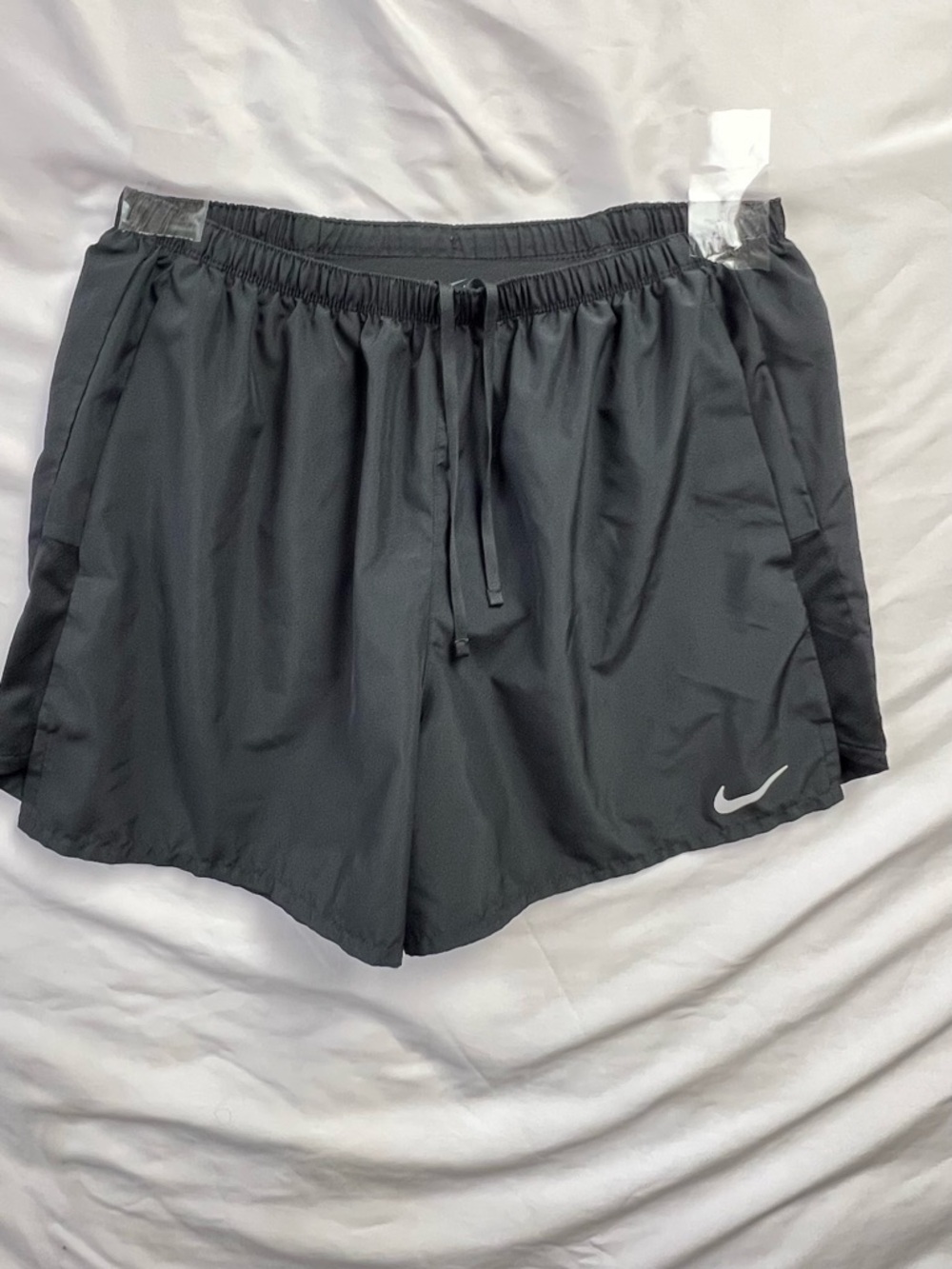 Nike Women's Gray Athletic Shorts with White Swoosh